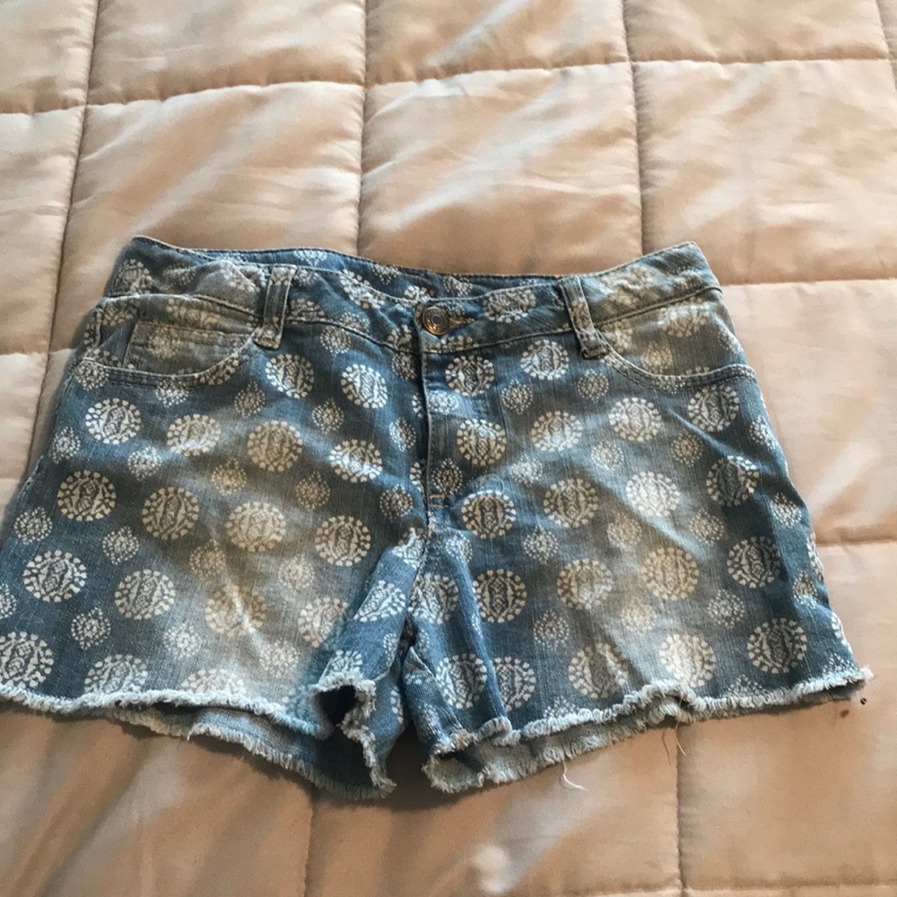 Blue jean shorts with circle designs
